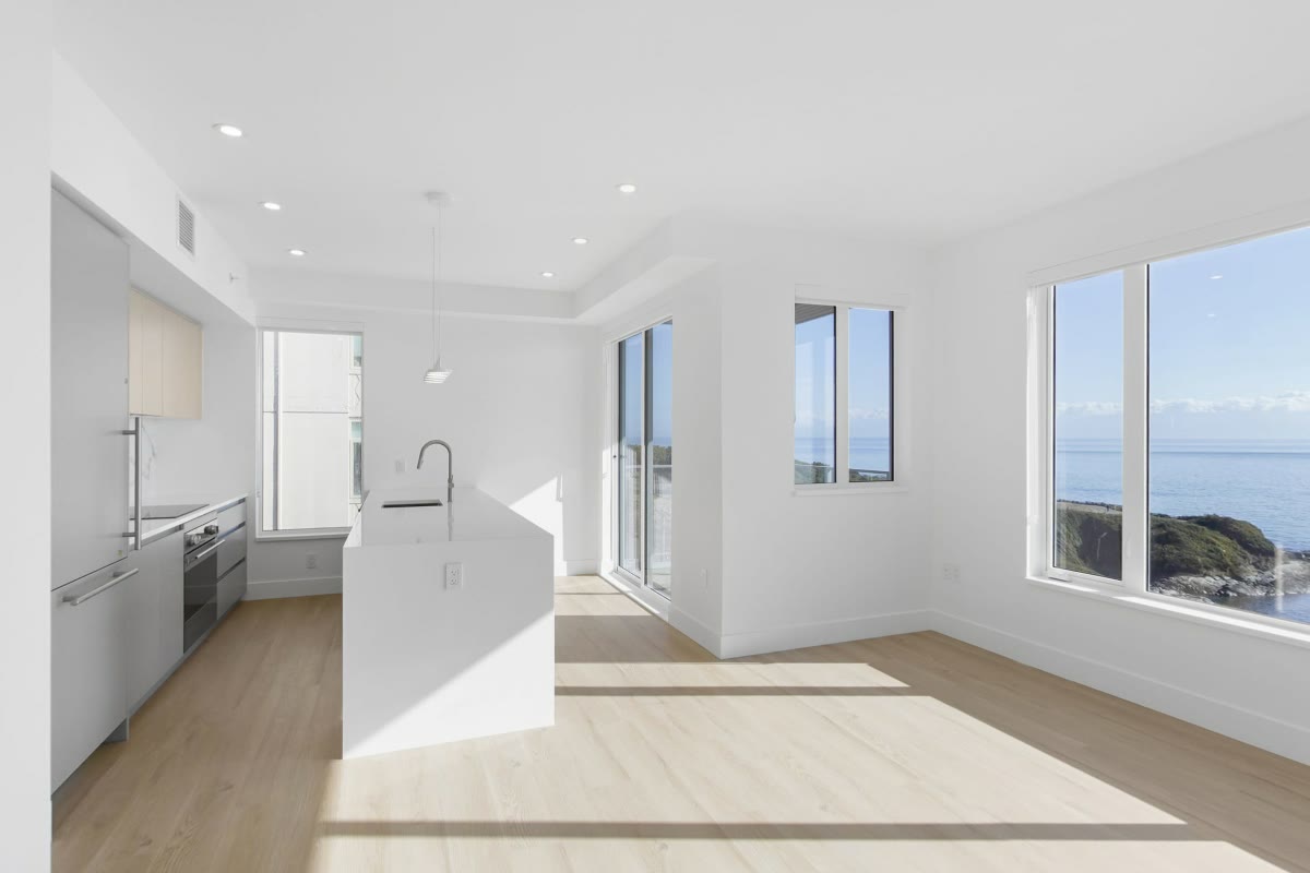 Open-plan living and kitchen with an ocean view